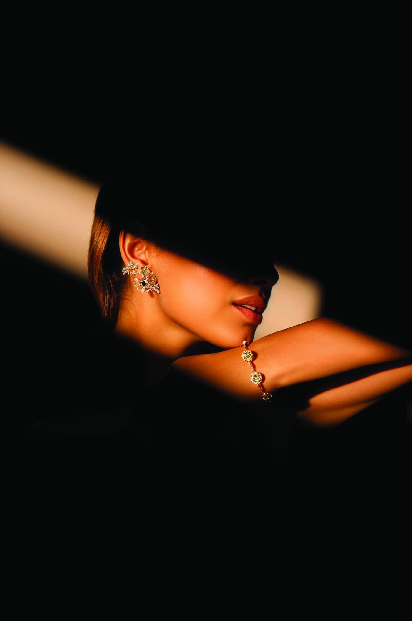 Salmina jewelry portrait in warm cinematic light
